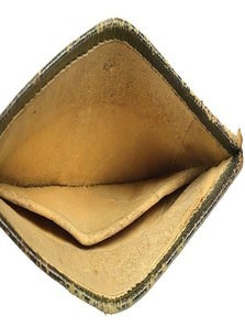 A 1795-DATED, MILITARY CAP OF GREEN MOROCCO LEATHER.