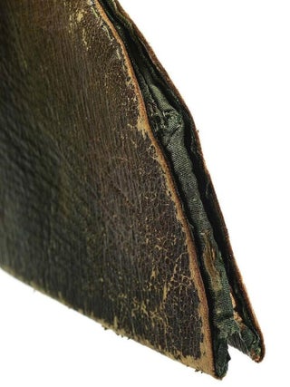 A 1795-DATED, MILITARY CAP OF GREEN MOROCCO LEATHER.